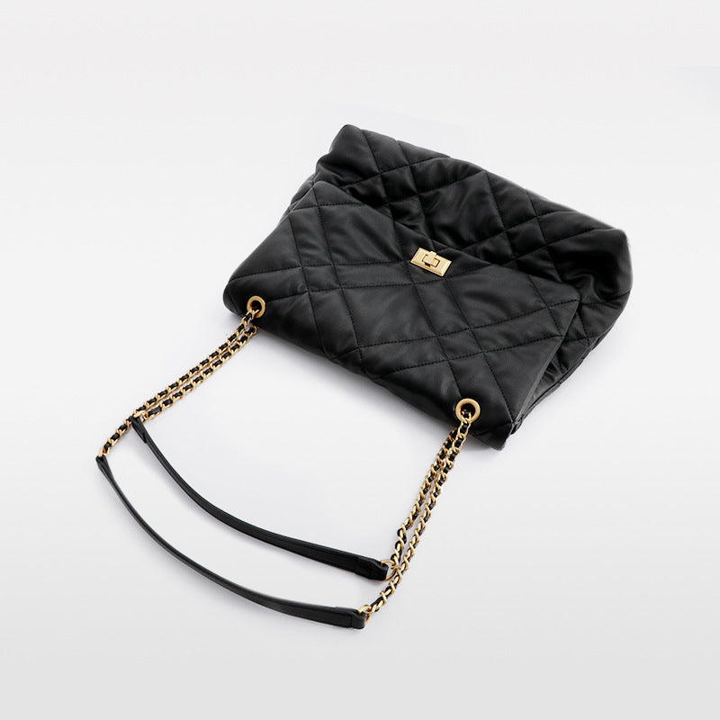 Elegant Quilted Black Shoulder Bag with Gold Hardware