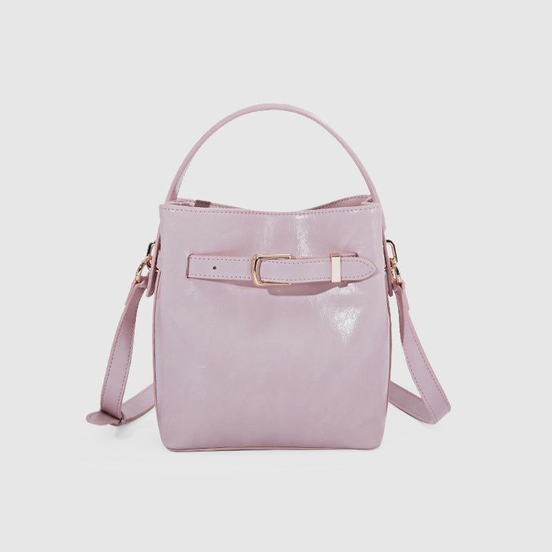 Modern Belted Crossbody and Handbag with a Sleek Structured Design