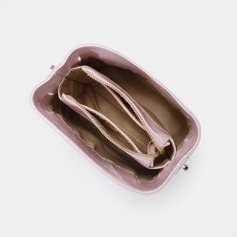 Modern Belted Crossbody and Handbag with a Sleek Structured Design