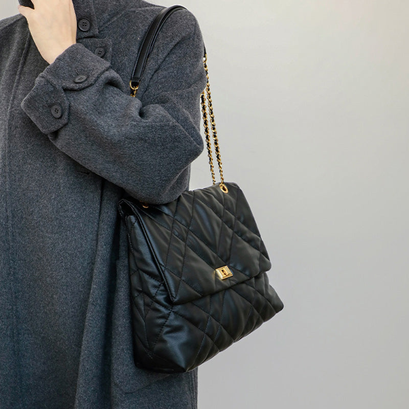 Elegant Quilted Black Shoulder Bag with Gold Hardware