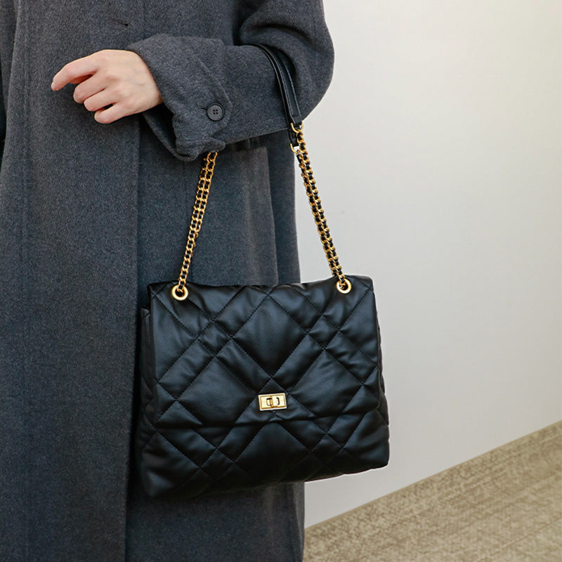 Elegant Quilted Black Shoulder Bag with Gold Hardware